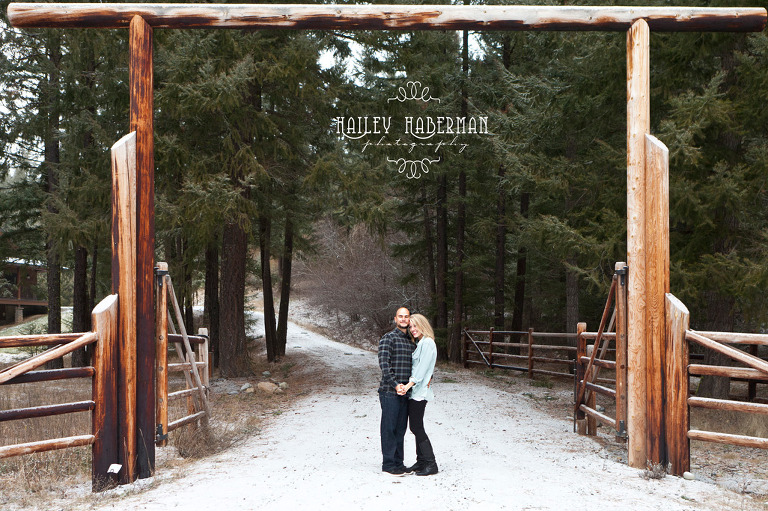 Winter Woodsy Engagement Blake & Mallory Cle Elum Wedding Photographer photo of couple under lodge entryway