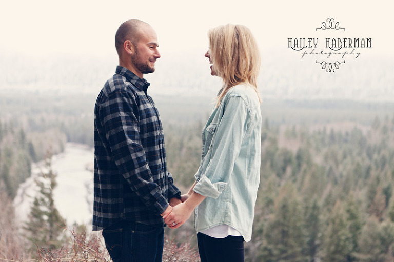 Winter Woodsy Engagement Blake & Mallory Cle Elum Wedding Photographer candid photo of couple on mountain viewpoint