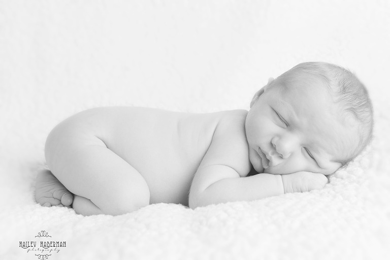 Baby Boy Cross, Ellensburg Newborn Photographer, photo of baby sleeping on tummy in black and white