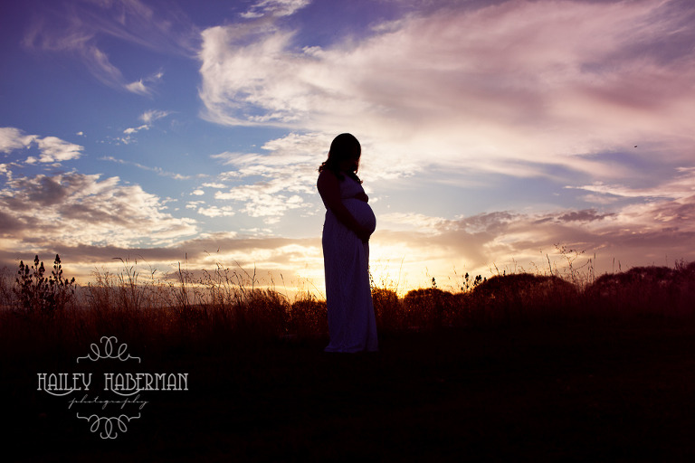Fall Maternity Matt & Amy  Ellensburg Photographer photo of expecting mom hugging baby bump against sunset, silloutte 