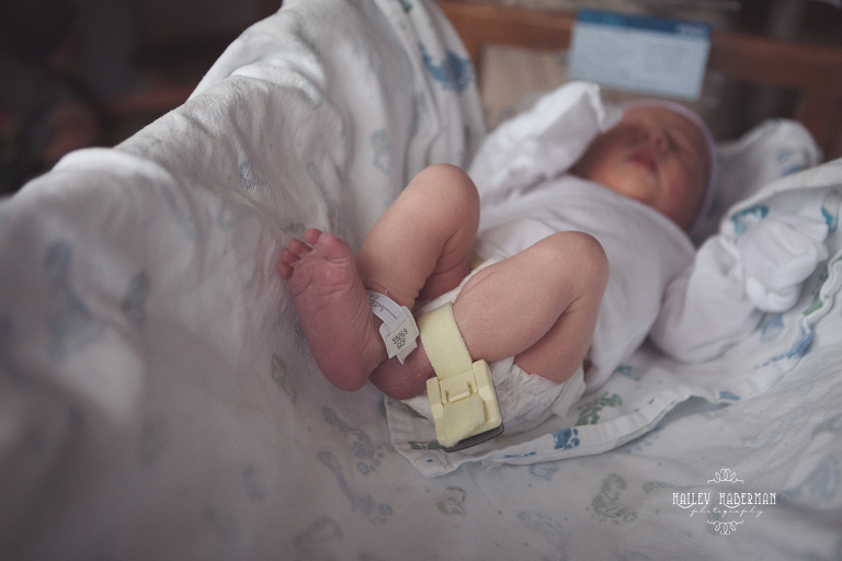 Ellensburg Newborn Photographer captures Baby Boy Ryle sleeping in hospital close up of ankles and feet