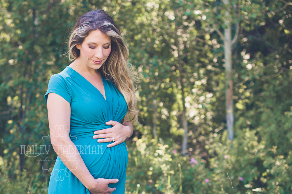 Spring Maternity Couple snuggling baby bump in black and white