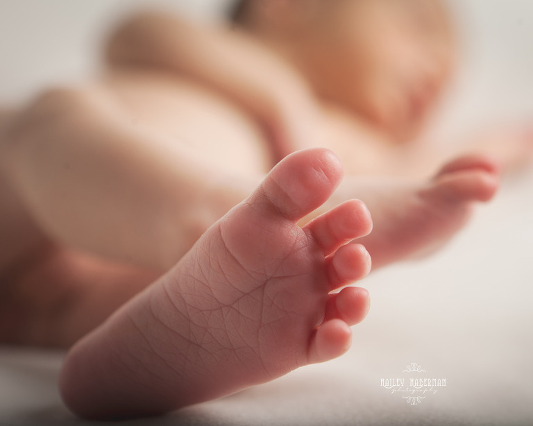 10 day old Newborn Baby Boy close up of feet in natural pose
