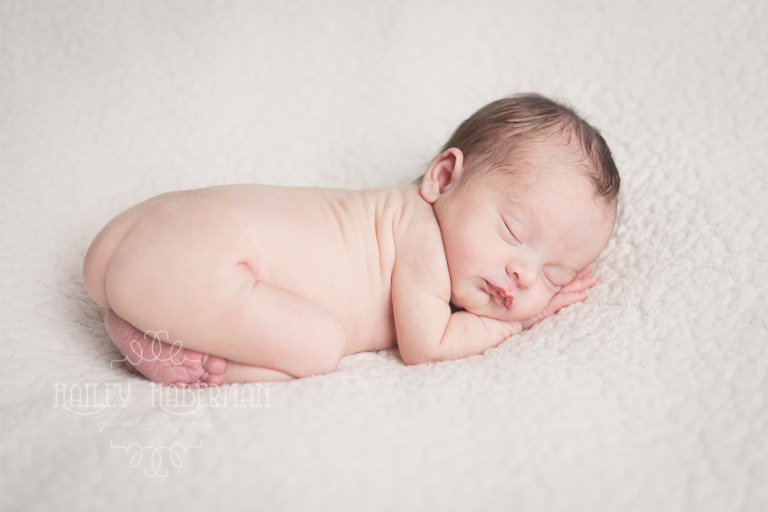 newborn baby girl sophia sleeping on her tummy