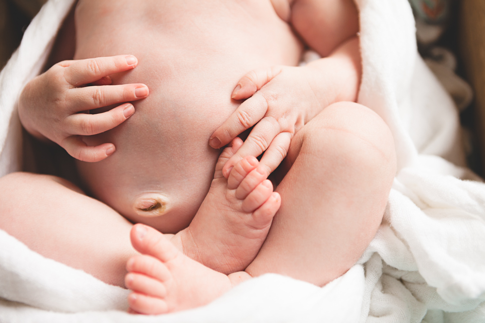 close up of newborn hands feet and belly button - ellensburg newborn photographer