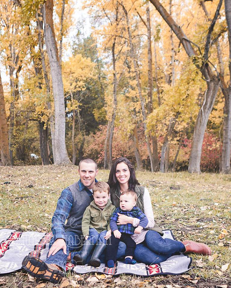 Fall Family Lifestyle Photographer photo of family smiling at camera