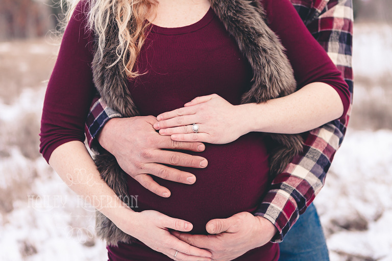Frosty Winter Maternity with Jennie & Wesley by Ellensburg Newborn Photographer, photo of parents hands around baby bump