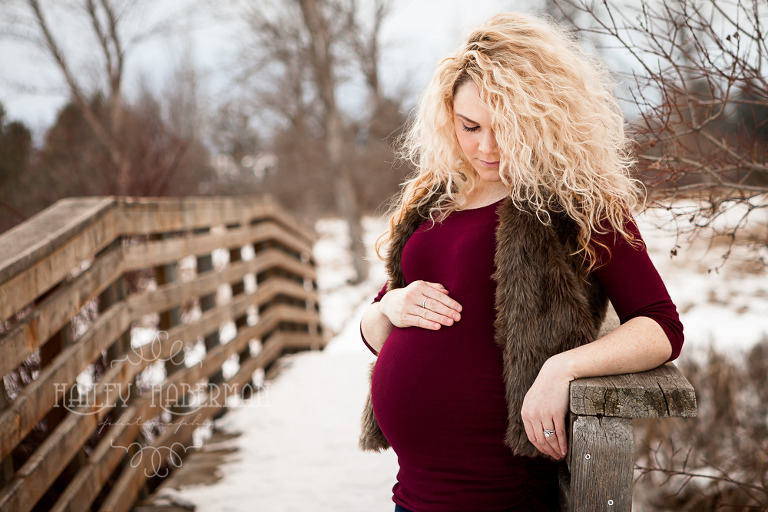 Frosty Winter Maternity with Jennie & Wesley by Ellensburg Newborn Photographer, photo of mother with hands on baby bump